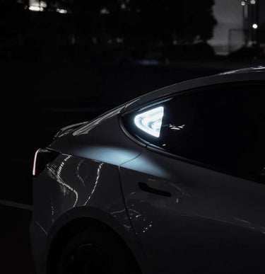 AnimeCarMod Deep Mirror Multi-Mode Light Quarter Window Diorama showing illuminated diorama scene with remote control in a car window.