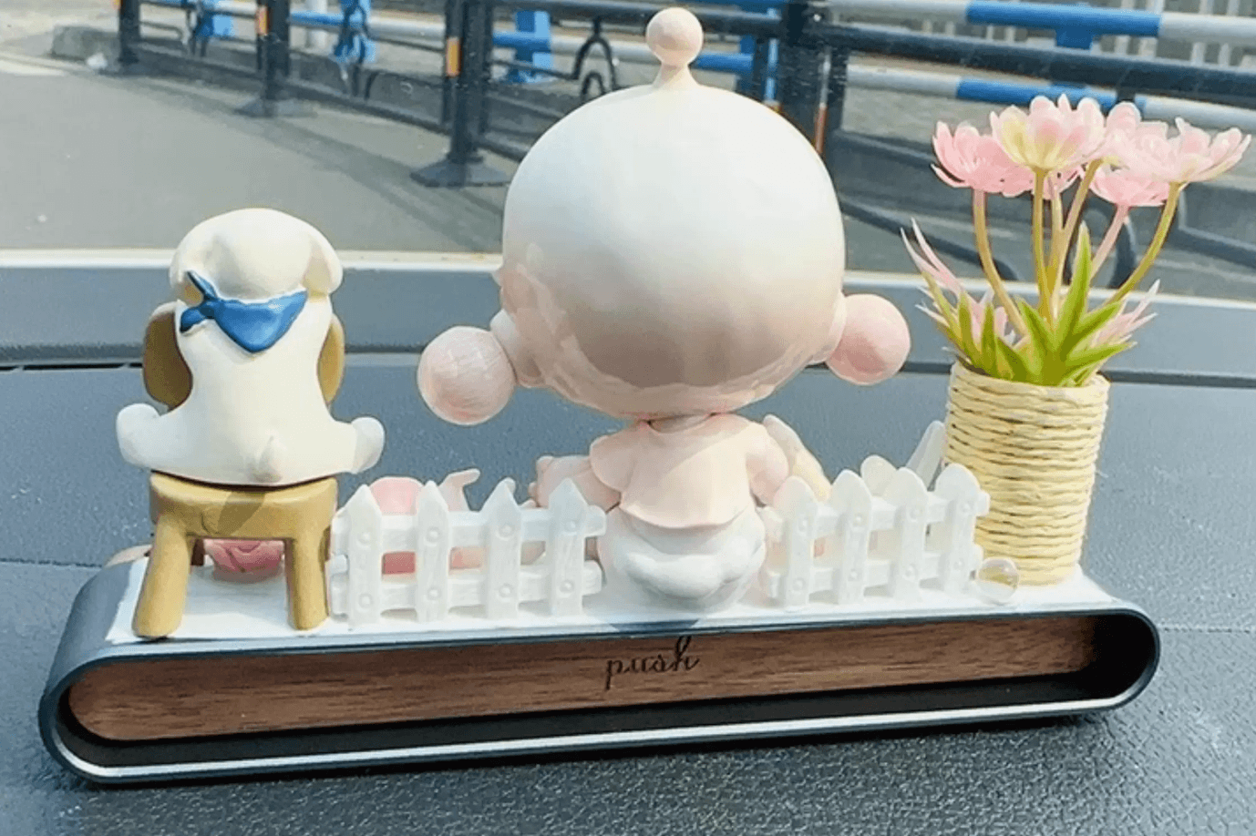AnimeCarMod soft bloom daydream car dashboard decor with parking number plate, featuring colorful floral design and decorative accents.