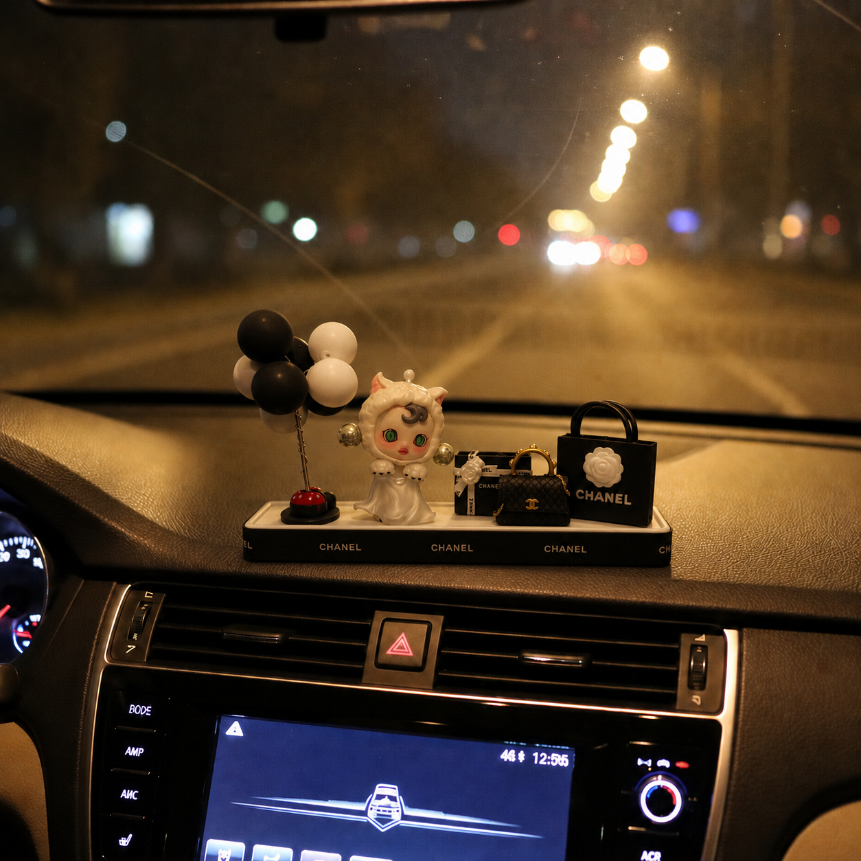AnimeCarMod Monochrome Kitty Boutique car dashboard decor featuring a cute cat design in black and white.